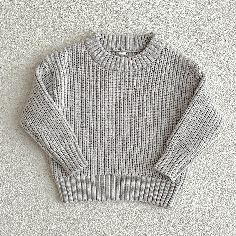 A light gray knit baby pullover sweater with a ribbed neckline and long sleeves.