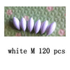 A close-up photo of 120 white oval fishing floats with bobber beads on a green background.