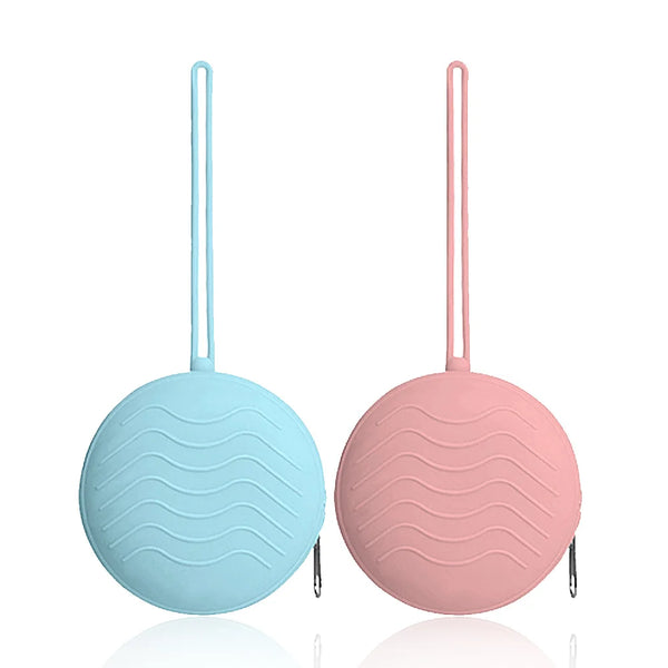 A pink silicone pacifier holder with a light blue silicone soother case.