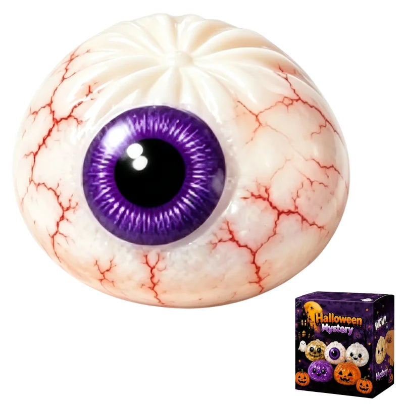 A realistic glass eye squishy stress ball toy with purple iris and red blood vessel markings.