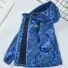 A royal blue kids waterproof winter jacket with a hood and black accents is displayed on a white surface.