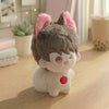 A cute anime plush charm with gray fur, pink ears, and a small red apple detail.