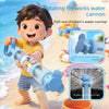 A young boy is using a blue rotating fireworks water cannon toy to spray water.