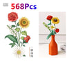 A set of 568 plastic building blocks depicting a floral bouquet with roses and sunflowers.