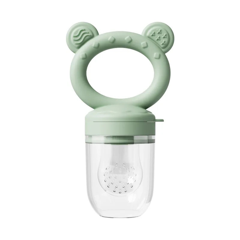 A light green silicone baby fruit feeder set with a clear plastic container and silicone molds.