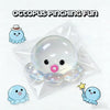 A clear squishy bubble squid toy is shown in a plastic sealed package with several small blue squishy toys.