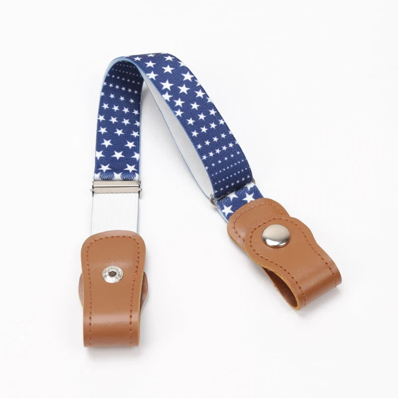 A blue and white star patterned canvas belt with a leather buckle and elastic stretch.