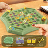 A green plastic tray holds a chess board with colorful stickers and pieces for a flip game