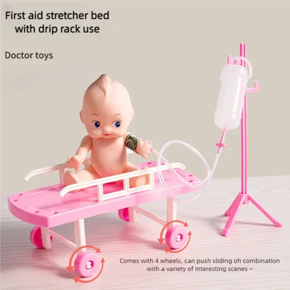Pink first aid stretcher bed with drip rack used for doctor toys