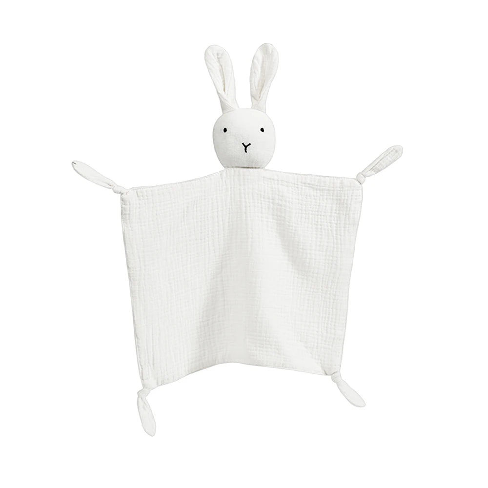 A white soft cotton muslin baby comforter blanket shaped like a bunny with long ears.