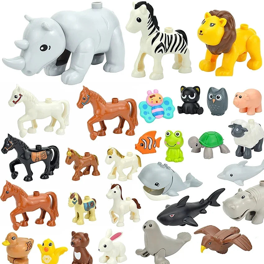 A collection of various zoo animal building blocks in various colors and styles.