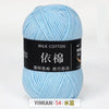 A ball of light blue milk cotton yarn labeled YIMIAN 54 with Chinese characters for knitting and crochet.