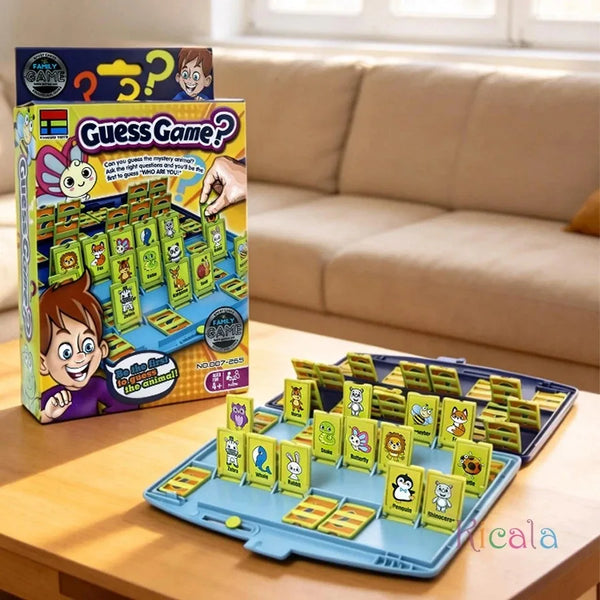 En boks med Guess Game-brettspill med fargerike kort og en treplate vist på et bord