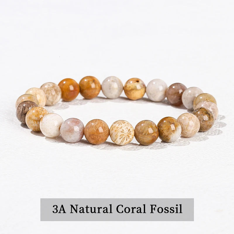 A bracelet made of 3A natural coral fossils with various shades of beige and brown stones.