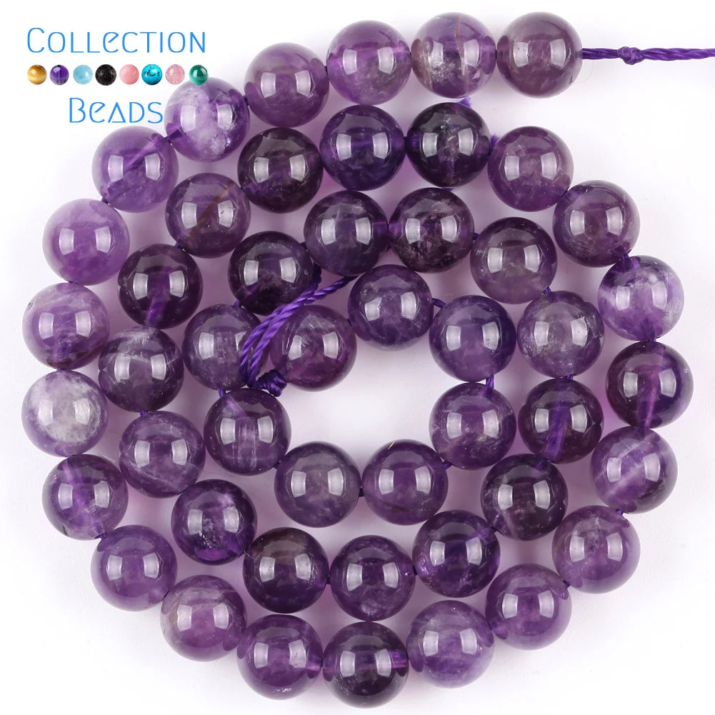 A collection of purple and violet natural sea sediment jasper and turquoise beads for jewelry making