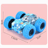 A blue pull-back inertia car toy with flip-over action featuring large rubber wheels and a decorative body.