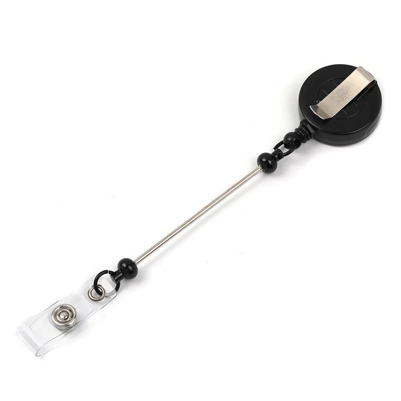 A beadable badge reel with a retractable clip and clear plastic holder.