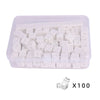 A clear plastic container filled with 100 white linking cubes for early math learning.