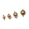Three spherical stainless steel magnetic clasps for jewelry making displayed against a white background.