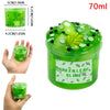 A jar of green leaf slime with black and lime decorations, shown next to a hand for scale.