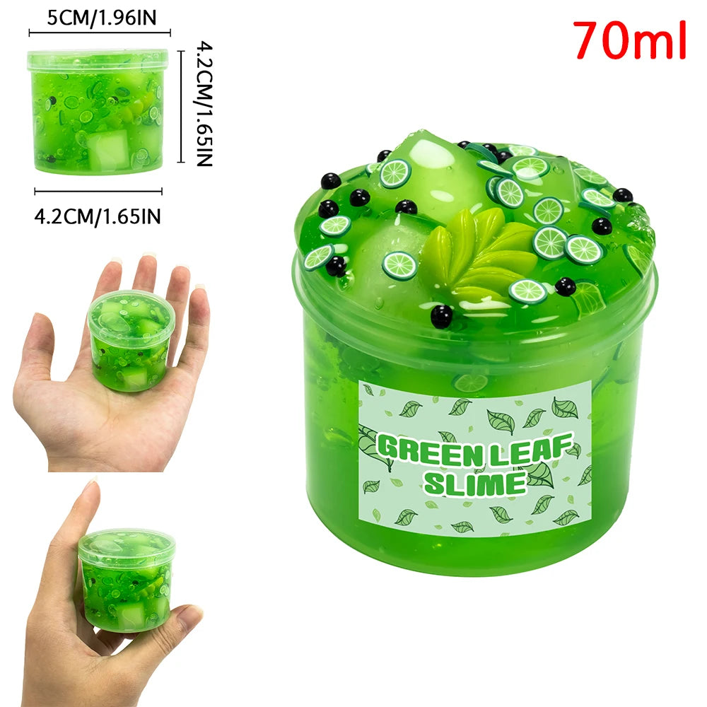 A jar of green leaf slime with black and lime decorations, shown next to a hand for scale.