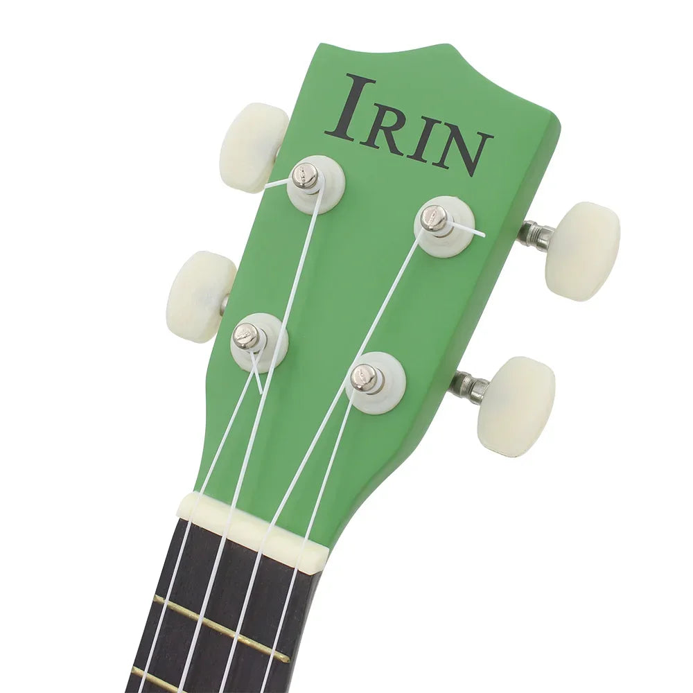 A green ukulele fretboard with the name IRIN carved into it and white tuning pegs.