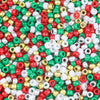 A close-up view of small, solid color pony beads in various shades of red, green, white, and gold.