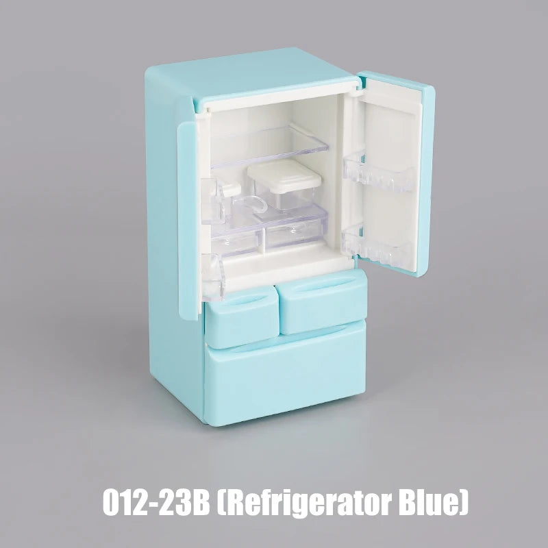 A light blue dollhouse furniture playset featuring a mini kitchen and living room set.