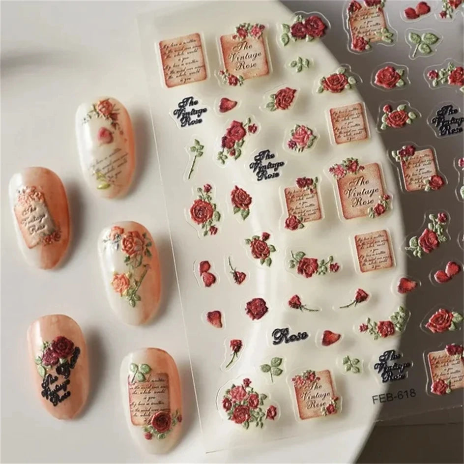 A sheet of nail art stickers featuring various roses and gothic elements for manicures.