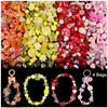 A mix of colorful acrylic beads in various shades including orange, yellow, red, and pink for DIY jewelry making.