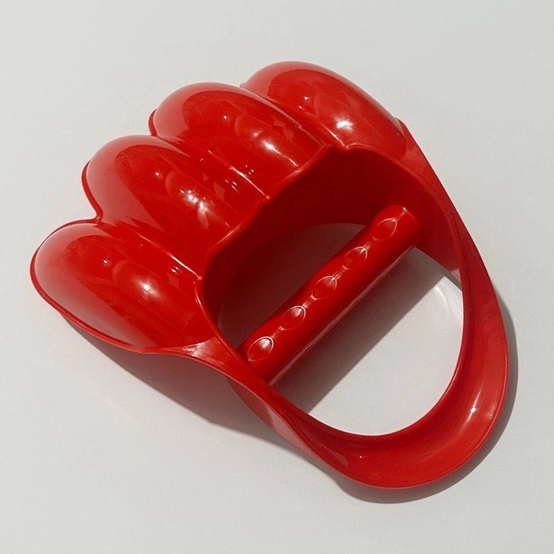 A bright red dinosaur claw sand digging toy for kids, shown from above.