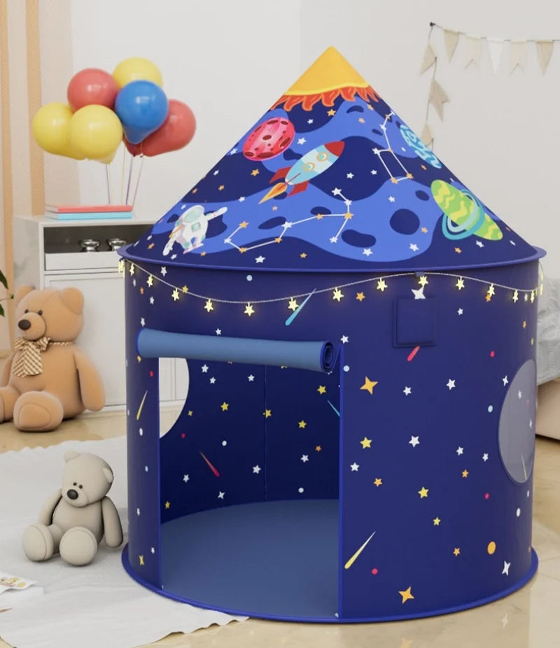 A blue rocket ship pop-up play tent with stars and planets for children