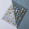 A collection of silver and gold gothic nail art stickers featuring animals, flowers, and decorative elements.