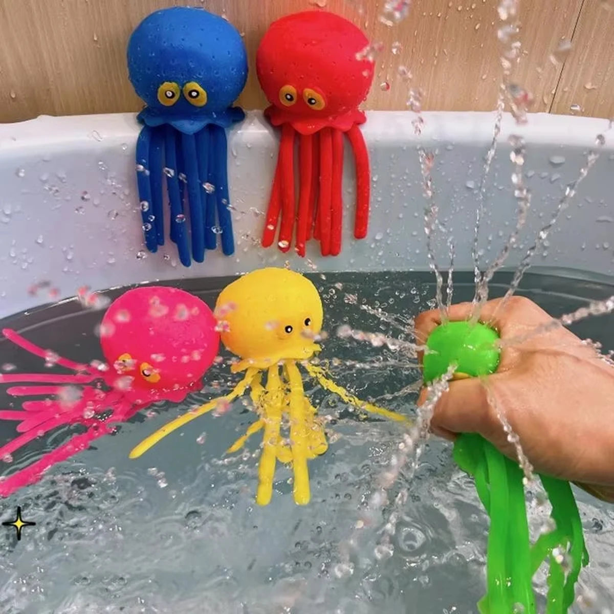 Colorful squeeze water octopus bath toys floating in a bathtub
