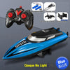 A blue high-speed RC boat is shown with its remote control, battery, and propeller components.