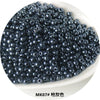 A pile of small, dark metallic glass beads used for jewelry and crafting.