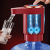 A hand pours water from a red electric dispenser pump into a glass, showing blue light inside the device.