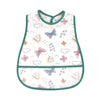 White baby bib with a green trim featuring a cartoon pattern of butterflies and clouds