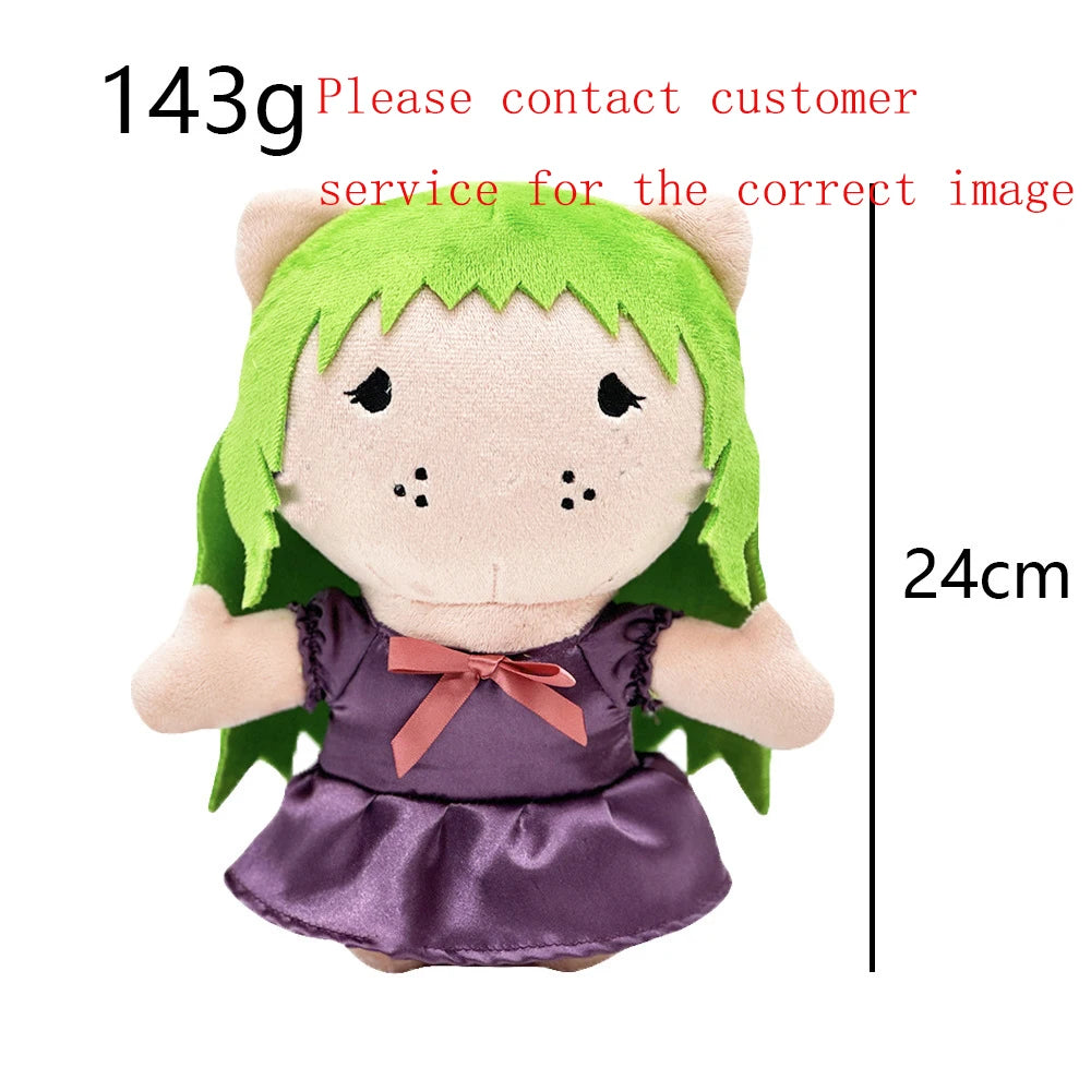 A plush doll of a green-haired character with a purple dress and pink bow.