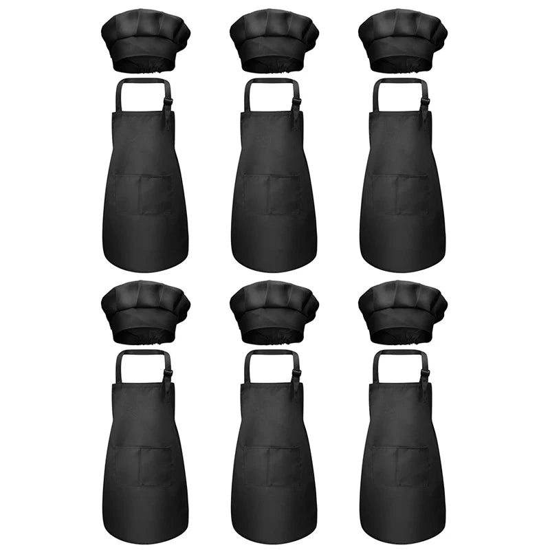 A set of black chef aprons and hats for kids, displayed vertically.