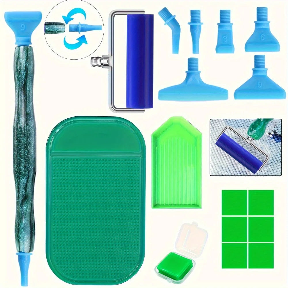 A complete diamond painting tool kit showing various tools and a green plastic mat.