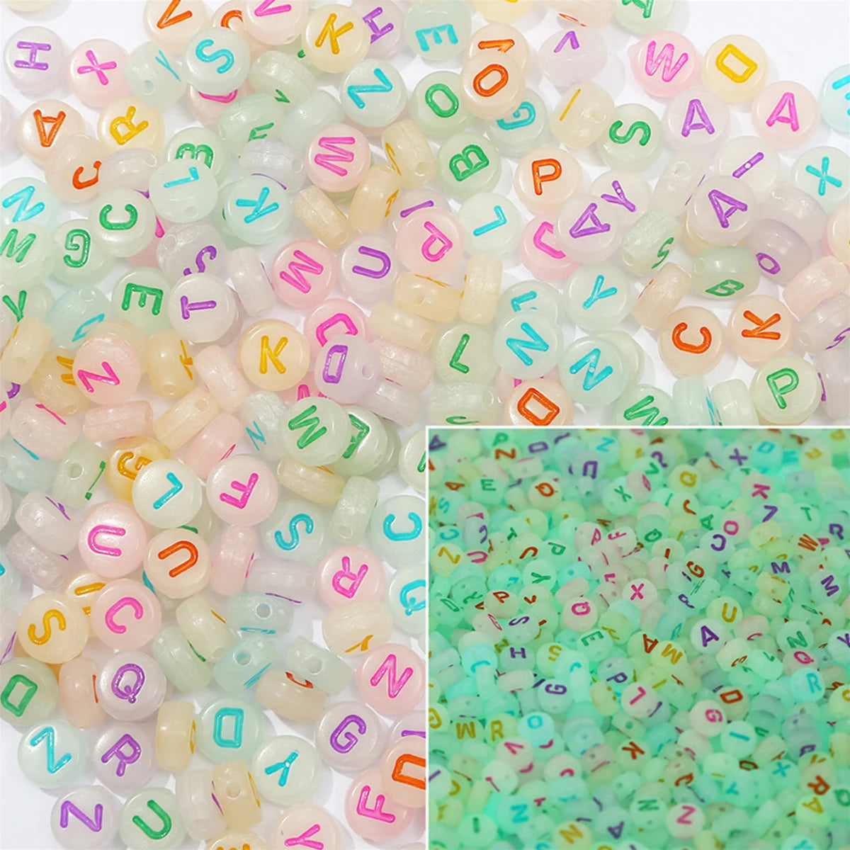 A close-up view of many round acrylic alphabet beads in various colors like pink, green, and yellow.