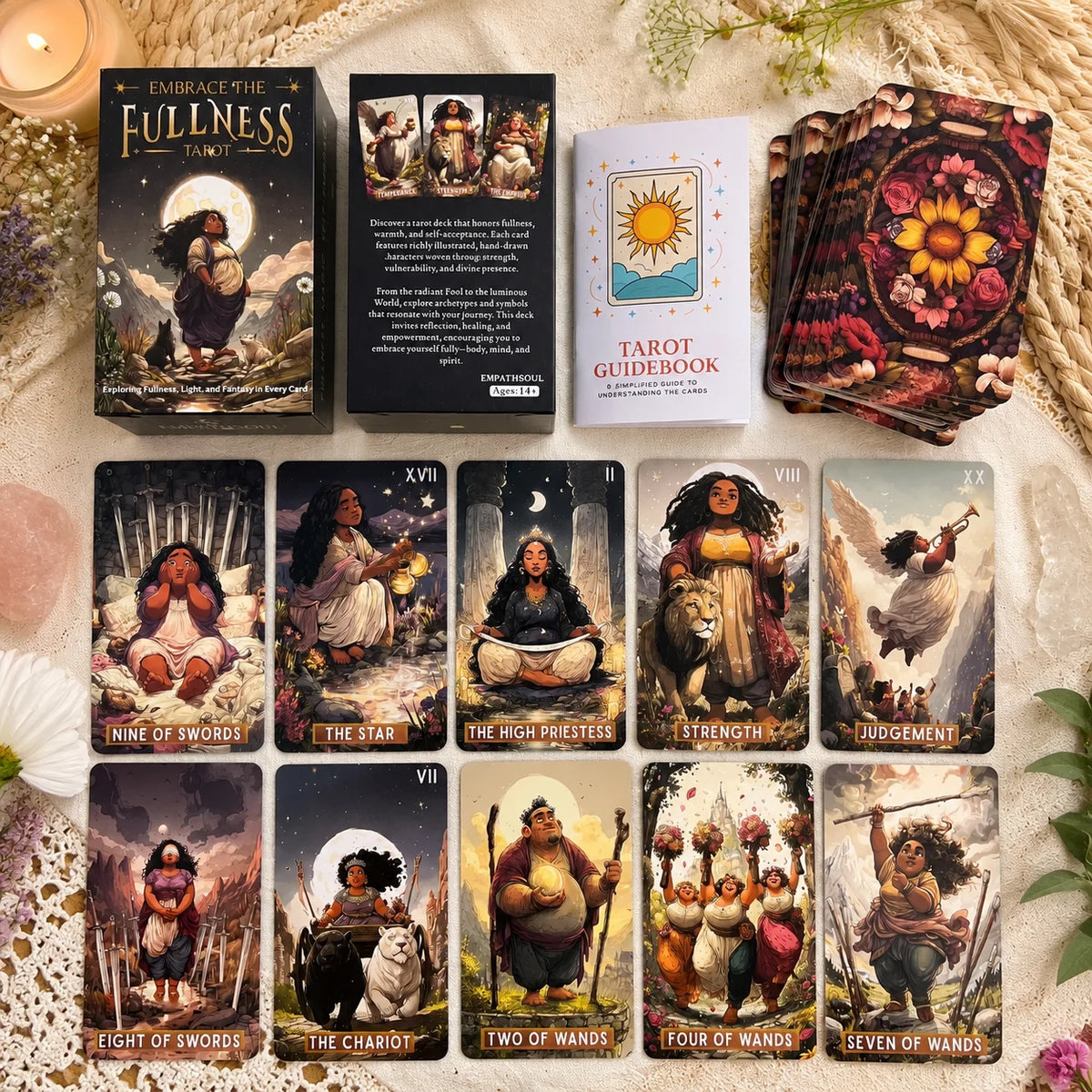 A collection of Embrace the Fullness Tarot cards featuring various imagery and a guidebook.