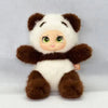 A plush pendant featuring a cute face design combining elements of a bear, rabbit, and sheep in brown and white fur.