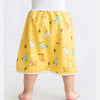 Yellow waterproof baby diaper pants with a skirt featuring animal designs for potty training