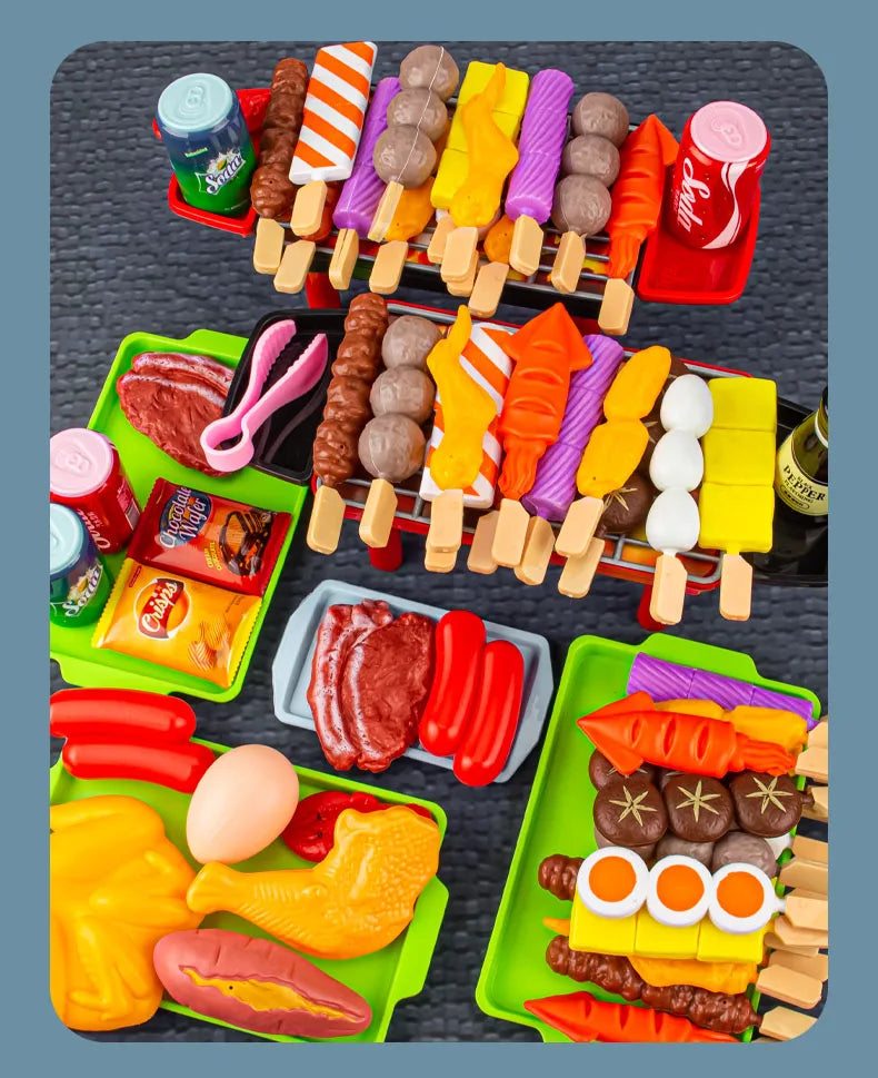A colorful display of mini barbecue food items including sausages, meats, vegetables, and condiments for pretend play.