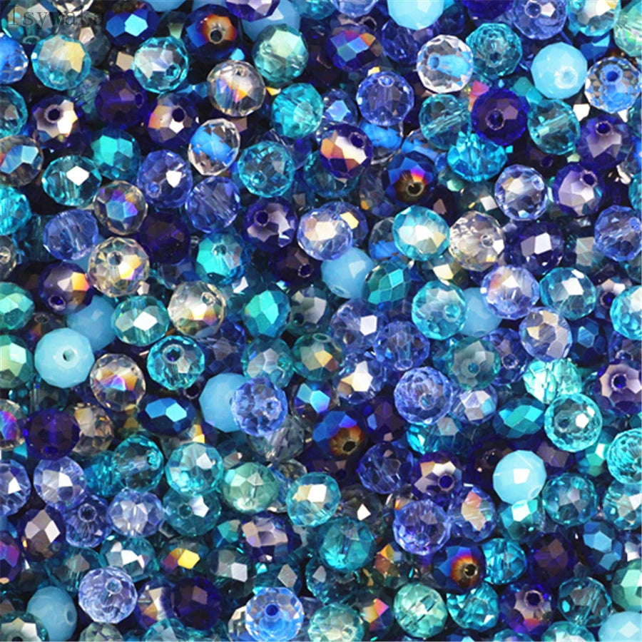 Multicolor round crystal glass beads in shades of blue, purple, and green for jewelry making
