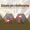 A row of five wooden hexagon tangram puzzles with colorful geometric shapes.