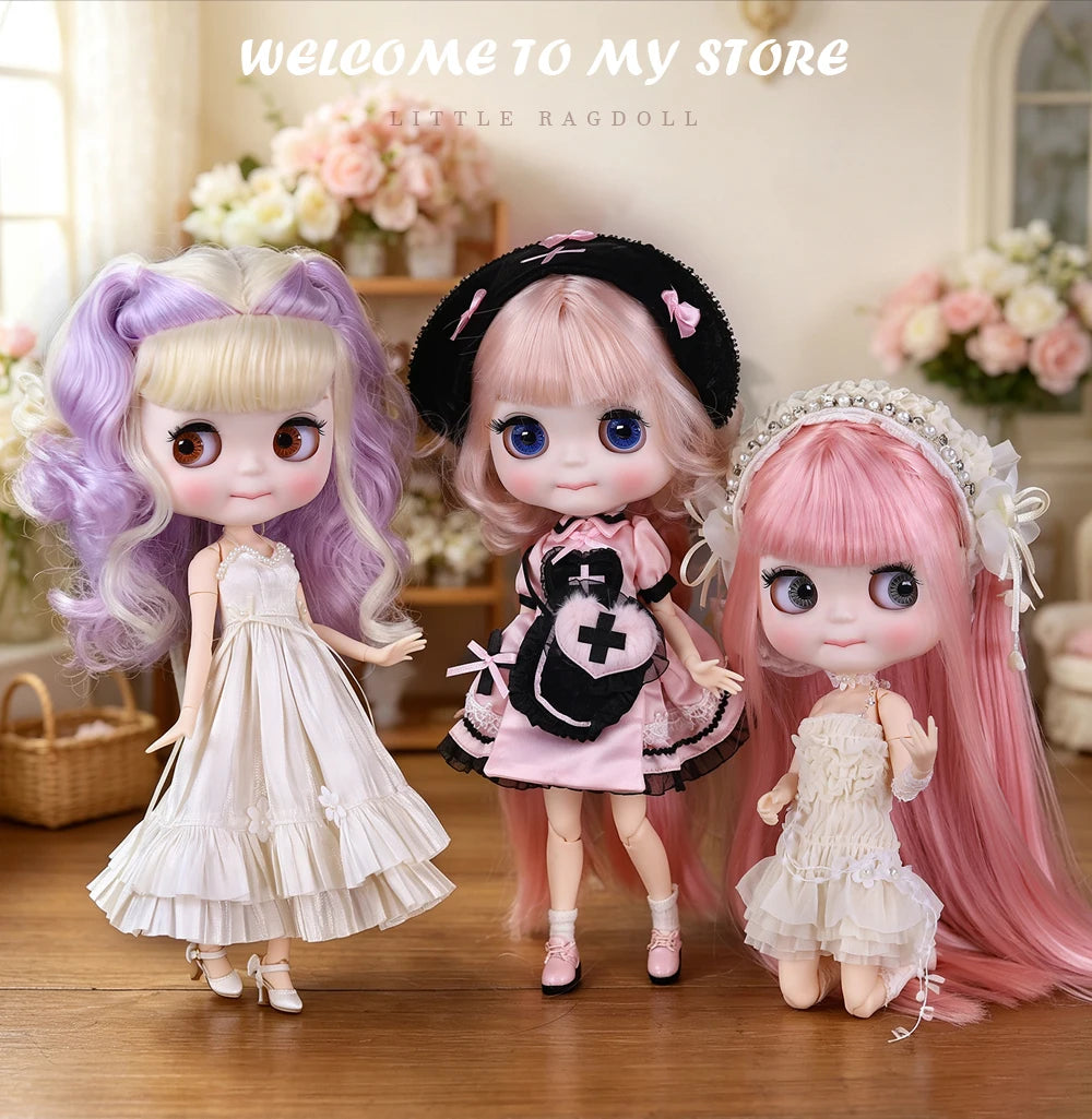Three cute fashion dolls with purple, pink, and lavender hair standing in front of a store welcome sign.