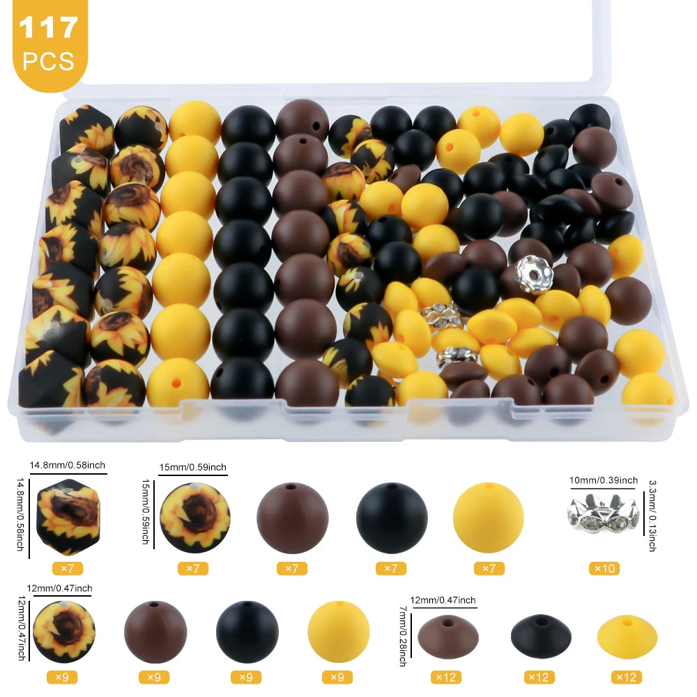 A plastic box containing 117 mixed beads and rhinestones for jewelry making, including various colored and sized round beads.